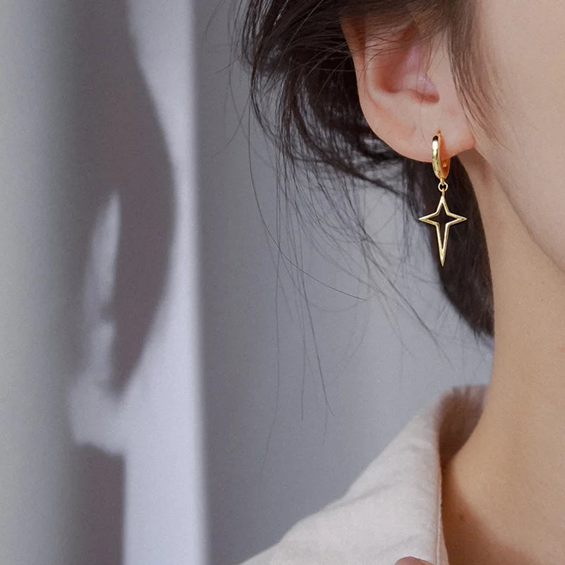 Punk earrings with a star motif