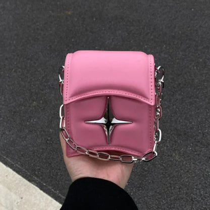 Handbag on a chain with a cross - pink