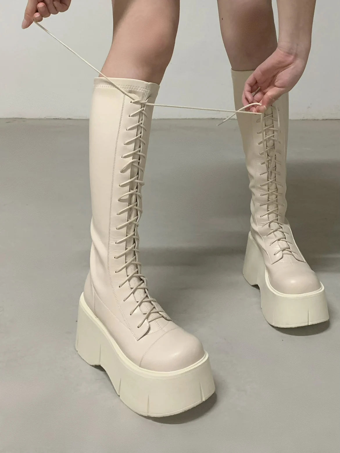 White lace-up motorcycle boots