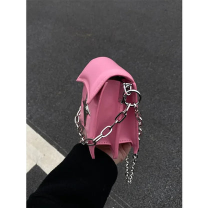 Handbag on a chain with a cross - pink